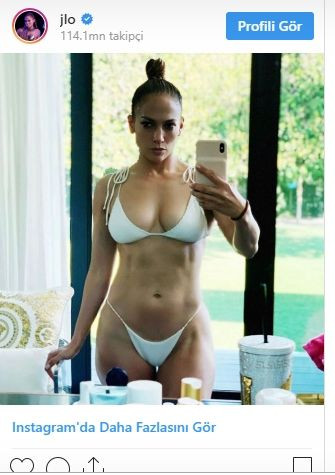 Jennifer Lopez'in beyaz bikinili karın kası şovu - Sayfa 1