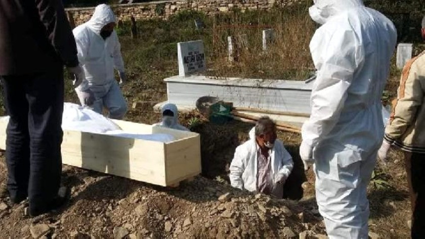 Koronavirüsten öldü, gömüldükten sonra tabutu yakıldı