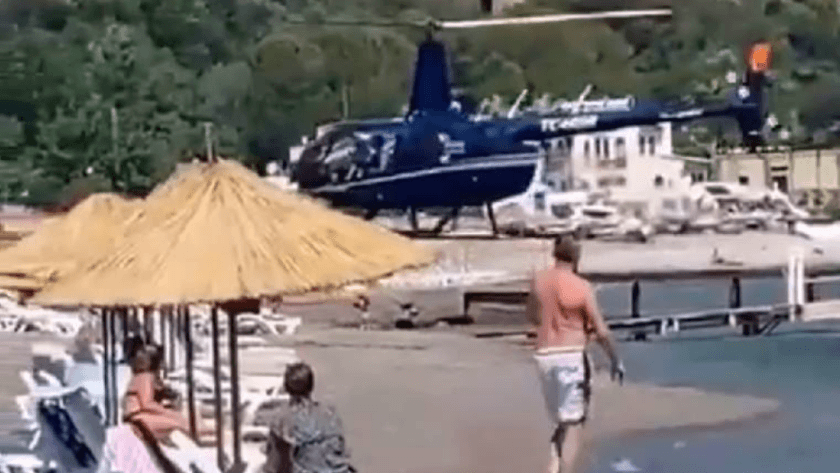 Marmaris'te halk plajına inen helikopter sosyal medyada olay oldu!