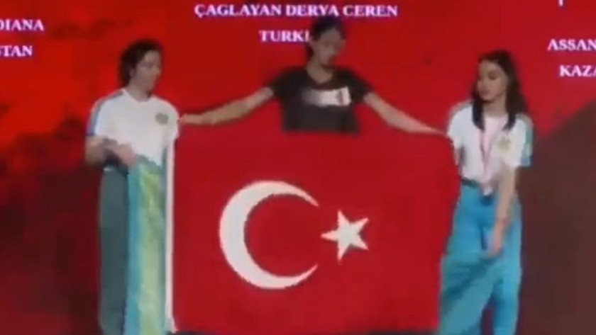Türk bayrağını kapatmaya çalışan sporculara Milli sporcumuzdan hamle!