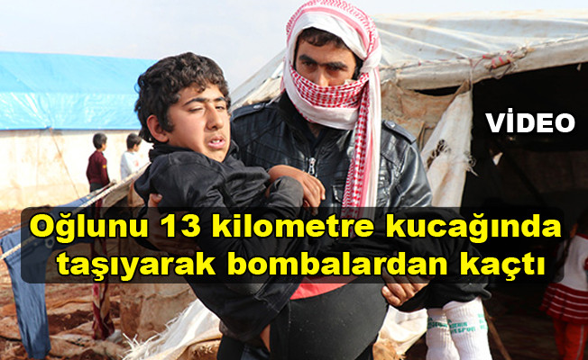Oğlunu 13 kilometre kucağında taşıyarak bombalardan kaçtı