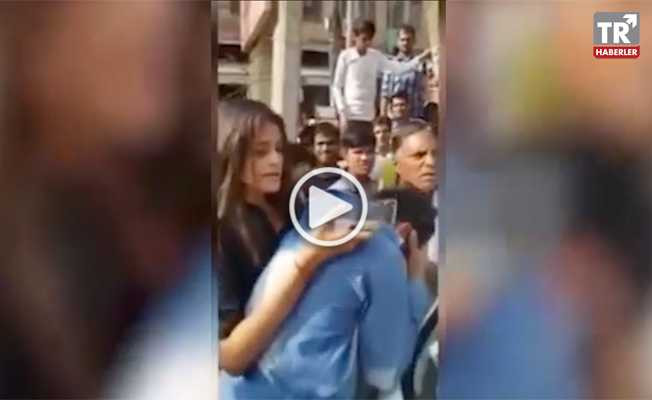 Genç kız tacizciyi önce dövdü, sonra polise teslim etti video izle