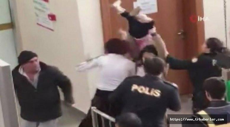 Duruşma sonrası öfkeli kadın bebeğini polislerin üzerine fırlatmaya kalktı