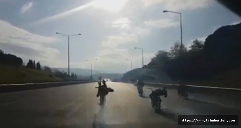 Motosikletle trafikte ölüme meydan okuyanlar kamerada! video izle