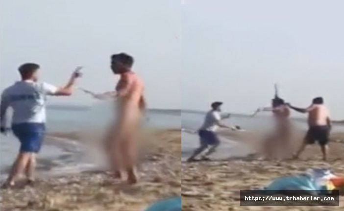 Plajda çıplak gezen adama vatandaştan meydan dayağı! video izle